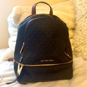 Miachel Kors brown signature backpack